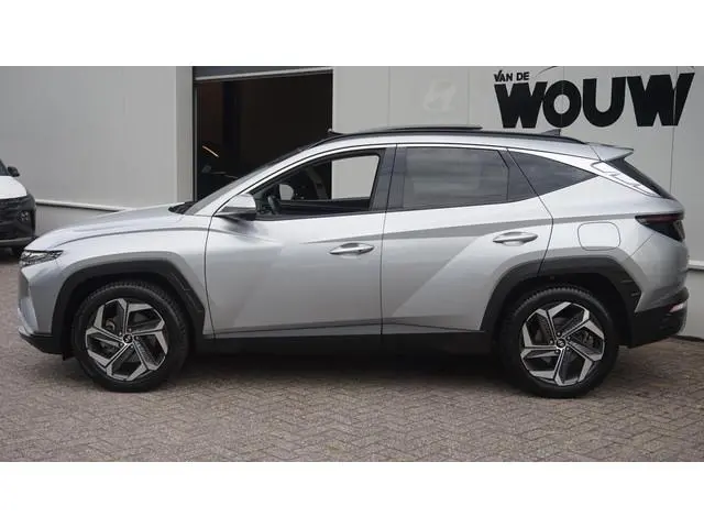 Hyundai Tucson 1.6 T-GDI HEV Premium Sky | Org. NL Auto | All-Weather banden | Panoramadak | Elektr...