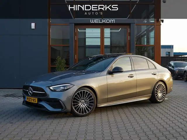 Mercedes-benz C-klasse 180 AMG Line | Pano | Sfeer | Led | Cruise | Trekhaak | Camera