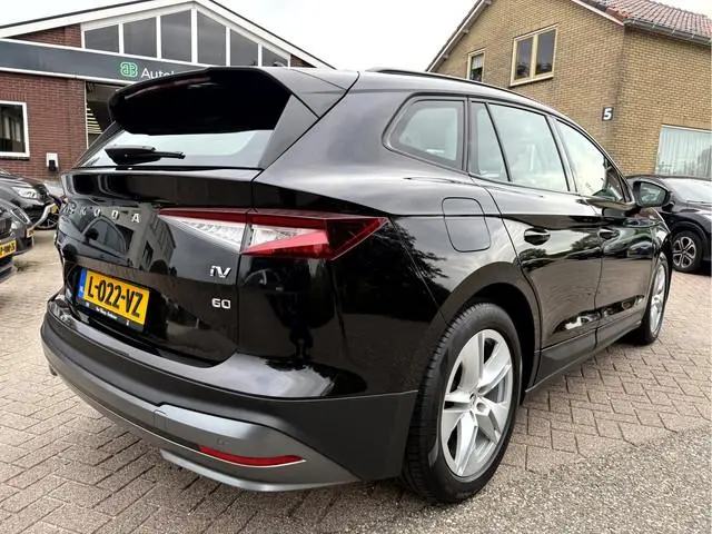 ŠKODA Enyaq iV 60 SOH 93.7%, Leer, Trekhaak Camera