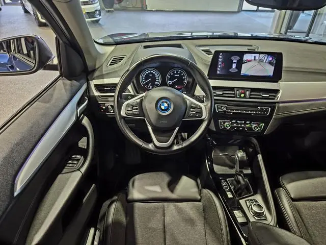 BMW X1 xDrive25e High Executive Sport Line | Blackline Blue |  Camera | HUD | Stoelverwarming