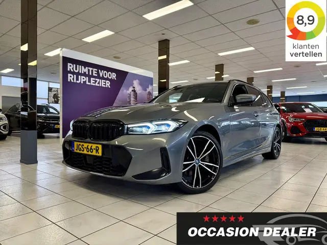 BMW 3-serie Touring 330e xDrive *PANO*H&K*360CAM*LEER*HUD*VOL*