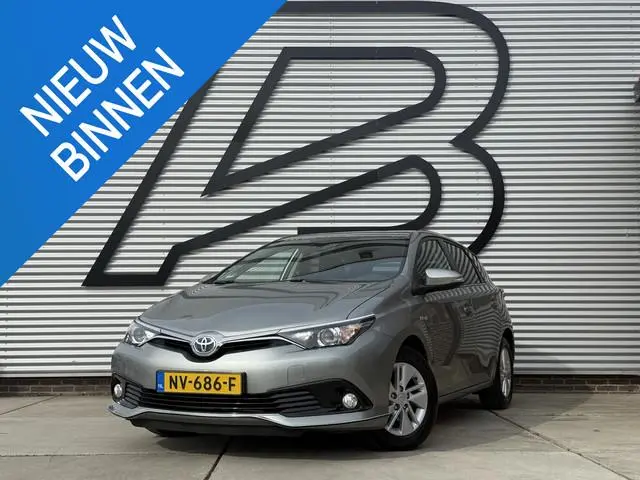 Toyota Auris 1.8 Hybrid Lease Pro 2e Eigenaar|Navi|Clima|Cruise|Camera|Trekhaak|Elek ramen|APK tot 0...