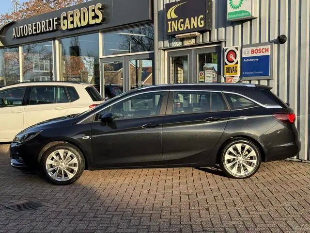 Opel Astra Sports Tourer. 1.0 Business+ | TREKHAAK | PDC V/A | CARPLAY | NAVI | CRUISE |