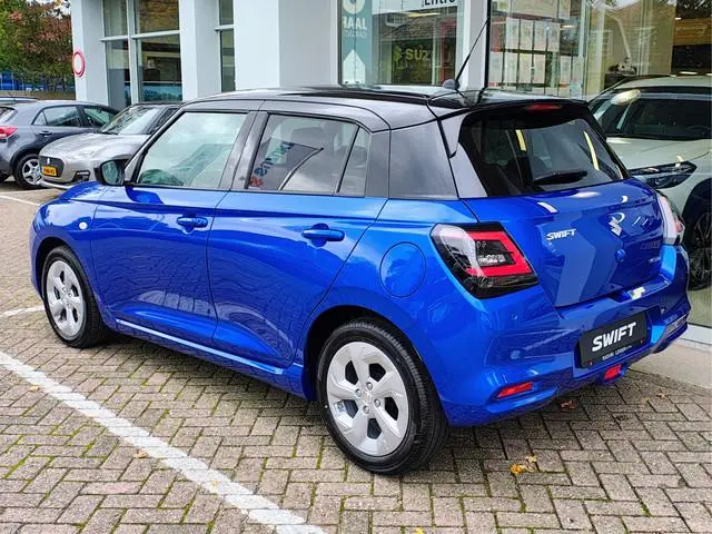 Suzuki Swift 1.2 STYLE SMART HYBRID AUTOMAAT Direct Leverbaar | Tot 10 JAAR GARANTIE! Inclusief € 2....