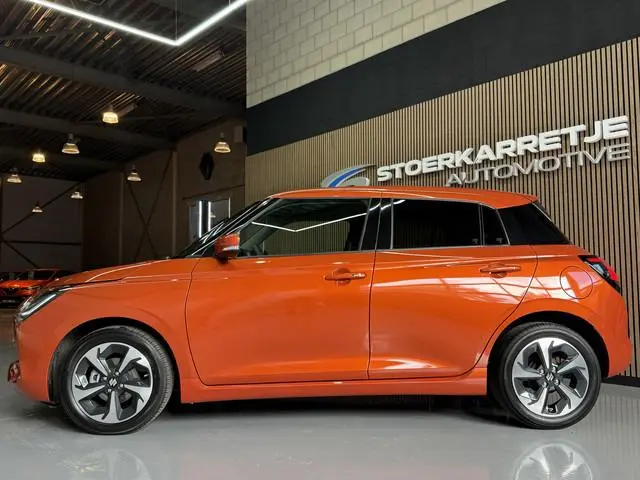 Suzuki Swift 1.2 Comfort + Hyb | Aut | Navi | 16" | Carplay | Stoelverwarming | ACC | Dodehoek | 100...