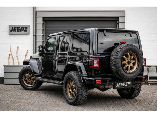 Jeep Wrangler Unlimited 4xe 380 / OFD voorburmper / KMC 20" velgenset