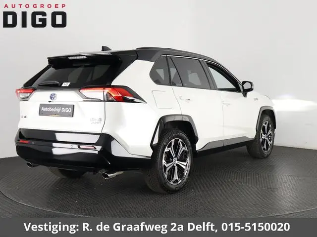 Toyota RAV4 2.5 Plug-in Hybrid AWD Bi-Tone Plus | 1500 KG trekgewicht | JBL Audio | Stoelverwarming...