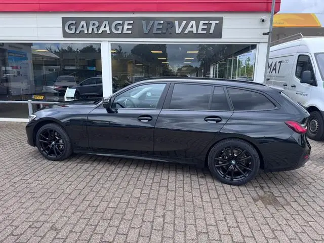 BMW 3-serie Touring 330e High Executive