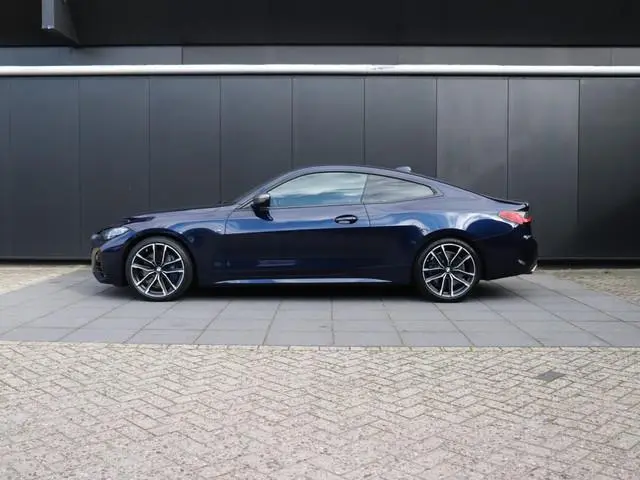 BMW 4-serie Coupé M440i xDrive High Executive | LEDER | MEMORY | SCHUIFDAK | H&K | CAMERA | SPORTSTO...