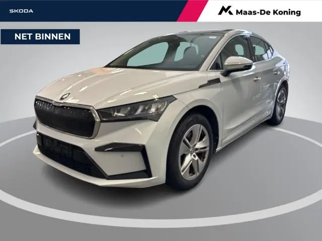 Skoda Enyaq Coupé iV 60 180pk · SOH 94,1% · Panoramadak · Camera · Apple/Android Car Play · 19"Velge...