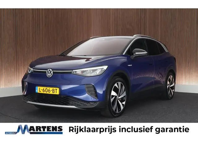 Volkswagen ID.4 First 77 kWh 204pk SOH 87% Trekhaak Camera Warmtepomp Stoelverwarming Navigatie