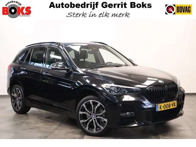 BMW X1 sDrive20i High Executive M-sport Panoramadak PDC Trekhaak NAP Head-Up 24 maanden garantie mogelijk (*vraag naar de voorwaarden)