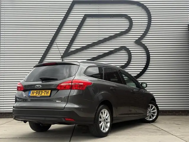 Ford Focus Wagon 1.0 Titanium 1e Eigenaar|Navi|Clima|Cruise|Carplay|Stoel+Stuur verw|PDC V+A|APK tot...