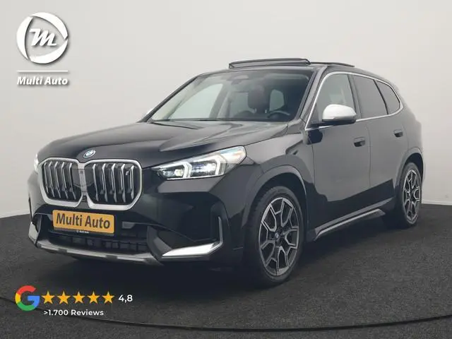 BMW iX1 xDrive30 X Line 67 kWh 313pk Dealer O.H. | Trekhaak Af Fabriek | Panodak | Head Up | Adaptiv...