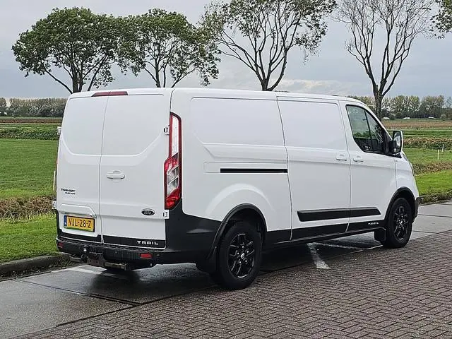 FORD TRANSIT CUSTOM 2.0 L2 TRAIL NAP Euro6 3-ZIts/Leer Lm-Velgen Raptor-Grille Trekhaak Onderhoudshi...
