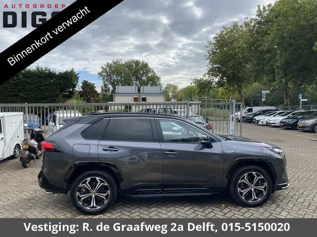 Toyota RAV4 2.5 Plug-in Hybrid AWD Bi-Tone Plus | 1500 KG trekgewicht | JBL Audio | Stoelverwarming...