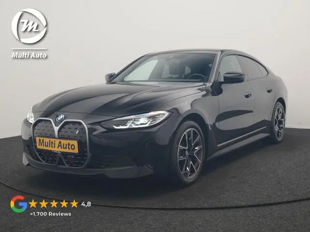 BMW i4 eDrive 35 70 kWh 286pk Dealer O.H | SOH 96,3% | Adaptive Cruise | Camera | Lederen Sportstoel...