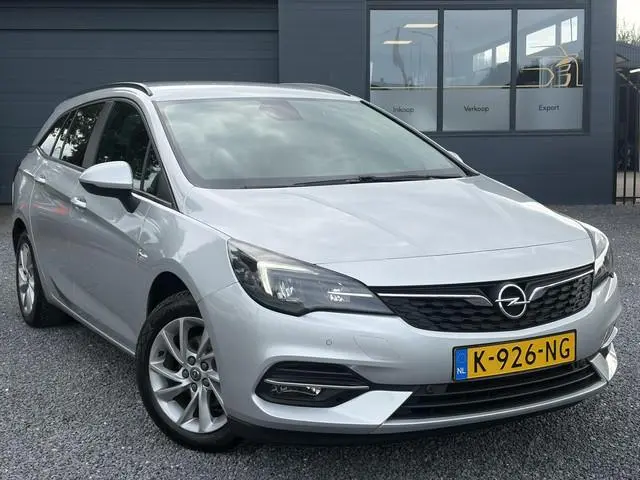 Opel Astra Sports Tourer 1.2 Business Executive ✓1e Eigenaar✓146pk✓Camera✓Trekhaak✓Carplay✓Airco✓Cru...