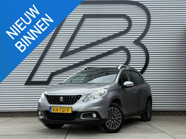 Peugeot 2008 1.2 PureTech Blue Lion 2e Eigenaar|Navi|Pano|D-riem vv in 2025|Airco|Cruise|PDC|N.A.P|A...