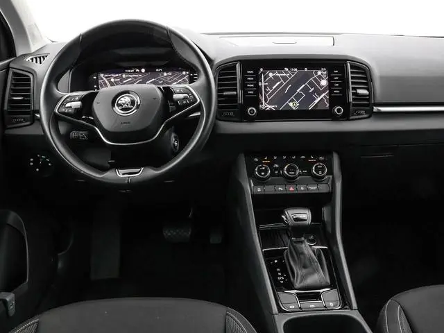 Skoda Karoq 1.5 TSI ACT 150pk DSG Business Edition · Camera · Inklap. Trekhaak · Keyless · Stuur- &...