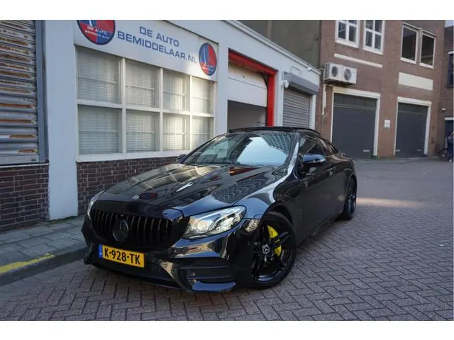 Mercedes-Benz E-klasse Coupé 350 AMG Line | Black Optic | Pano | Sfeer | Leer | Adaptive + Lane | 36...