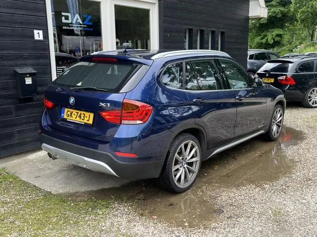 BMW X1 sDrive20i High Executive Aut/Ecc/Leer/Navi/Pano