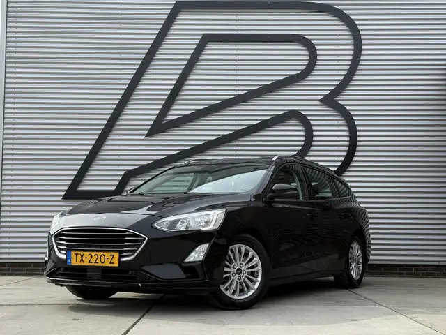Ford Focus Wagon 1.0 EcoBoost Titanium Business Navi|Cruise|Trekhaak|Stoel+Stuur verw|Carplay|B&O|PD...