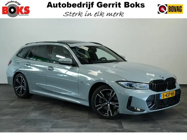 BMW 3-serie Touring 320e Panoramadak PDC ACC HI-FI M Sport Trekhaak 24 Maanden garantie* (Vraag naar...