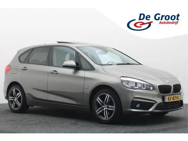 BMW 2-serie Active Tourer 218i Centennial High Executive Panoramadak, Leer, Head-Up, Trekhaak, Navig...