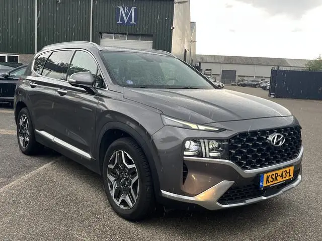 Hyundai Santa Fe 1.6 T-GDI PHEV Premium Sky 7p. APPLE CARP. | STOEL VENTILATIE/VERWARMING | 7 PERS |...