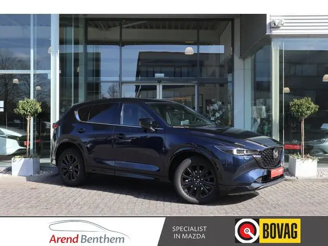 Mazda CX-5 2.0 e-SkyActiv-G M Hybrid 165 Homura Trekhaak / Bose / Camera / Head-Up / Leer / Navi / C...
