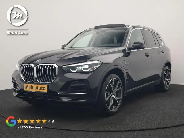 BMW X5 xDrive45e High Executive PHEV 395pk Dealer O.H. | Panodak | Luchtvering | 360 Camera | Adapti...