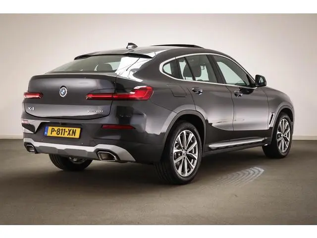 BMW X4 xDrive20i Business Edition Plus | PANORAMADAK | HEAD UP | HOUTAFWERKING | STUURVERWARMING | 1...