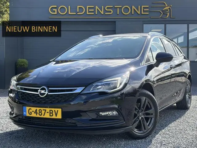 Opel Astra Sports Tourer 1.4 Turbo 120 Jaar Edition ✓150pk✓Carplay✓Navi✓Trekhaak✓Pdc V+A✓Clima✓Cruis...