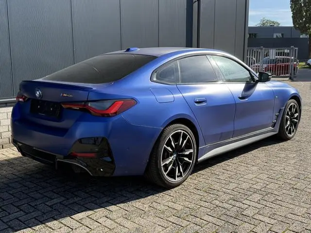 BMW i4 M50 High Executive 84 kWh 19"/SOH 99%/Lederen M-stoelen + memory/Harman Kardon/Keyless/Camera...