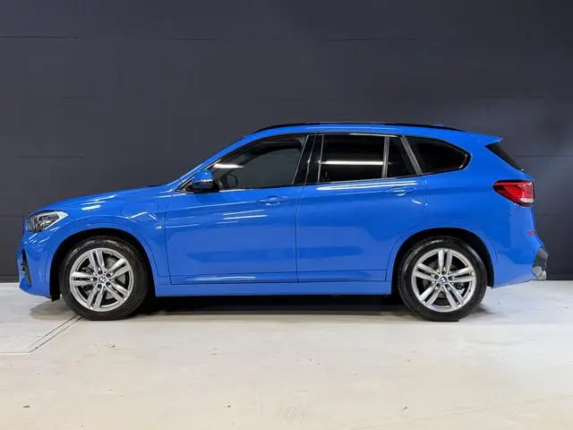 BMW X1 xDrive25e High Executive | M-pakket | Camera | Afn. trekhaak | Leder | Sfeerverlichting | Ful...