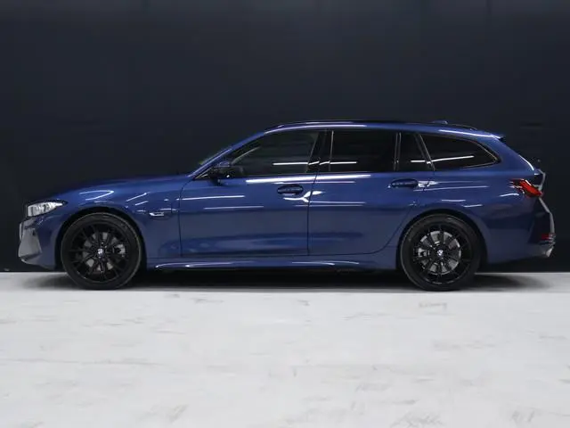 BMW 3-serie Touring 320e FACELIFT SOH 94% [TREKHAAK UITKLAPBAAR, SOH: 94%, APPLE CARPLAY, ELEKTRISCH...
