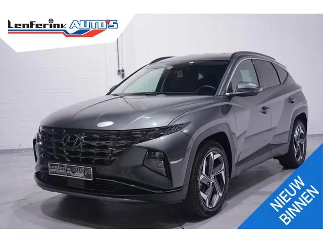 Hyundai Tucson 1.6 T-GDI HEV Premium 1e eign. NAP Navigatie DAB ACC ECC Bleutooth stoel/stuur verwar...