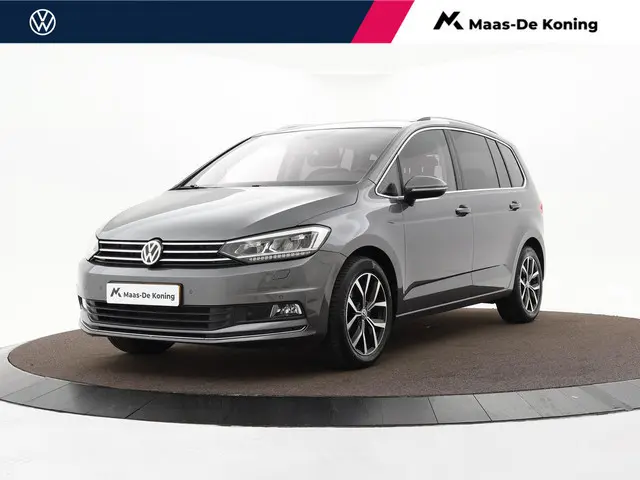 Volkswagen Touran 1.4 TSI 150pk DSG Highline 7p · Camera · Wegklapbare Trekhaak · Apple/Android Car...