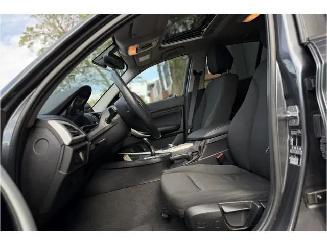 BMW 1-serie 118i Centennial Executive | Panodak | PDC | LED