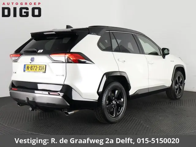 Toyota RAV4 2.5 Hybrid AWD Bi-Tone | 1650 KG trekgewicht | Trekhaak | Parkeersensoren | Apple Carpla...
