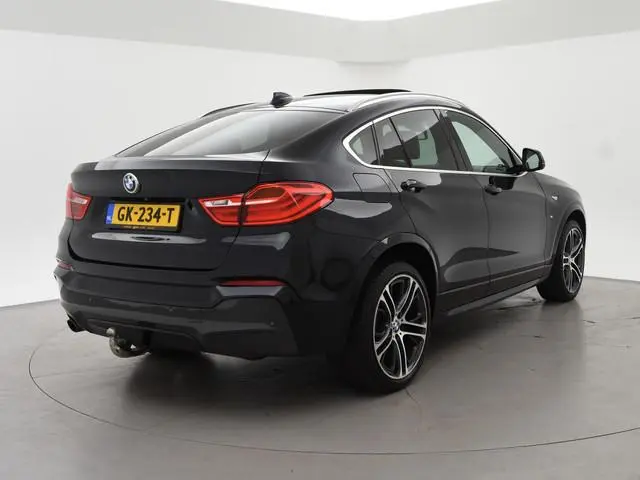 BMW X4 xDrive20i M-SPORT + SCHUIFDAK | TREKHAAK | HEAD-UP | 20 INCH LMV | MEMORY