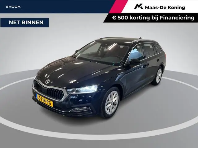 Skoda Octavia Combi 1.0 e-TSI 110pk DSG Business Edition · Inklap. Trekhaak · Keyless · Elek. Achter...
