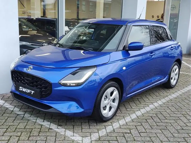 Suzuki Swift 1.2 SELECT SMART HYBRID Direct Leverbaar | Tot 10 JAAR GARANTIE! | Inclusief € 2.200,-...