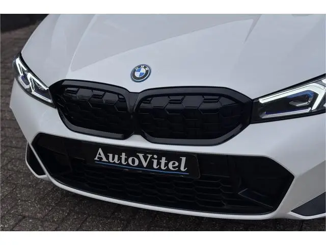 BMW 3-serie Touring 330e M-Sport | 19,5 kWh Accu | Panodak | Head-Up | Memory | Trekhaak | 360° Came...