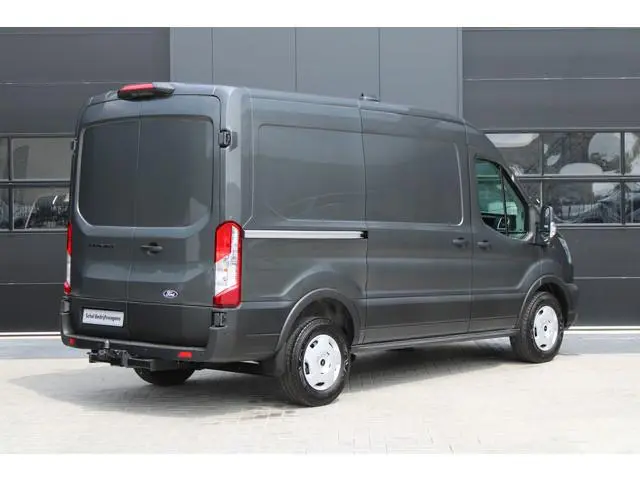 Ford Transit 350 2.0 TDCI L2H2 Trend 130pk - Facelift - 2x Schuifdeur - Adaptive Cruise - Navigatie...