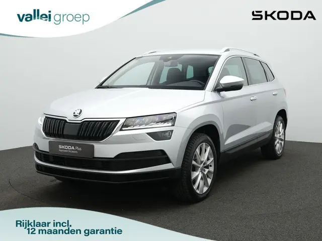 Skoda Karoq 1.5 TSI ACT 150 pk DSG Style | Trekhaak | Adaptive Cruise | Stoelverwarming | Carplay