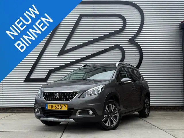Peugeot 2008 1.2 PureTech Allure 2e Eigenaar|Pano|Trekhaak|Carplay|D-riem vv in 2024|Clima|Navi|PDC|...