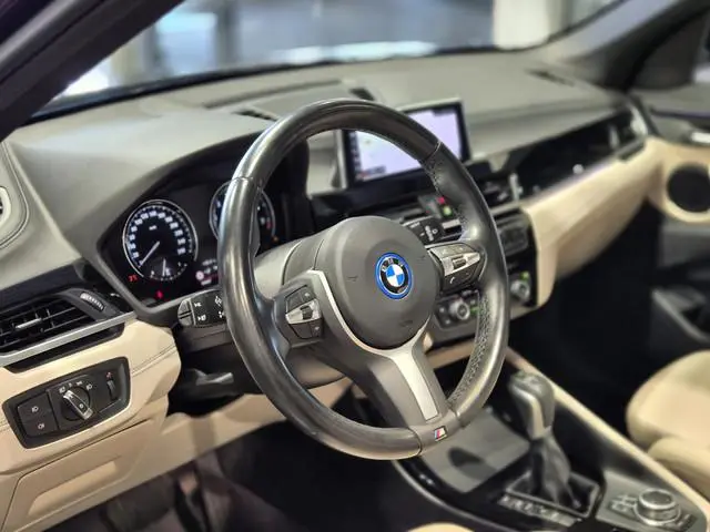 BMW X1 xDrive25e High Executive X-Line | Panorama | Beige leder | Camera | Stoelverw. | Carplay